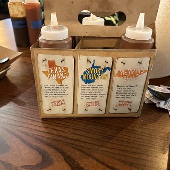 Mission BBQ - Sauces on table - Barbeque Near Me - Sterling Heights, Michigan Mission BBQ - Sauces on table - Barbeque Near Me - Sterling Heights, Michigan
