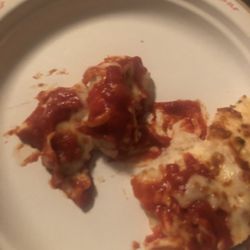 Pizza Hut - Half the sauce is on my floor. But you can still see how much was on the slice. Grossed out.