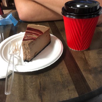Cheesecakes by Alex - Chocolate raz cheesecake and a small mocha. - Bakeries Near Me - Greensboro, North Carolina Cheesecakes by Alex - Chocolate raz cheesecake and a small mocha. - Bakeries Near Me - Greensboro, North Carolina