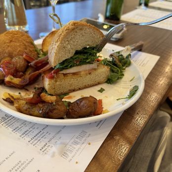 Sixty Vines - Here is the bun to chicken ratio. Heavy on the greens light on the chicken - New American Near Me - Austin, Texas Sixty Vines - Here is the bun to chicken ratio. Heavy on the greens light on the chicken - New American Near Me - Austin, Texas