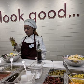 Salata - Daijah assembling salads. She does a great job. - Salad Near Me - Atlanta, Georgia