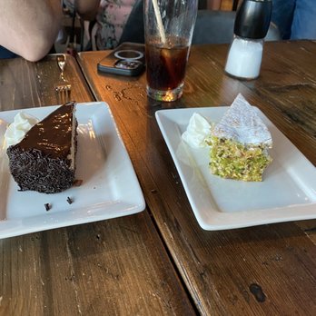 Riverview Restaurant & Bar - Chocolate delight dessert and pistachio sponge cake. - Bars Near Me - Burlington, New Jersey Riverview Restaurant & Bar - Chocolate delight dessert and pistachio sponge cake. - Bars Near Me - Burlington, New Jersey