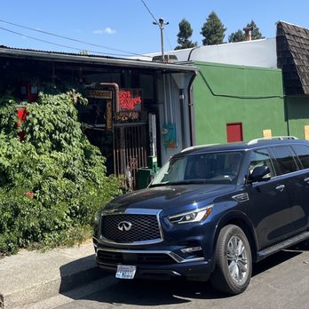 Loose Caboose Cafe - a car parked in front of it - Sandwiches Near Me - Willits, California