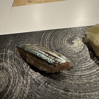 Sushi Oku - an image of a sushi on a cutting board - Sushi Bars Near Me - New York, New York Sushi Oku - an image of a sushi on a cutting board - Sushi Bars Near Me - New York, New York