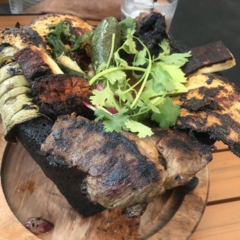 Kalaveras - Molcajete with beef, chicken and chorizo: $30 and enough to share for 2-3 people - Mexican Near Me - Montebello, California