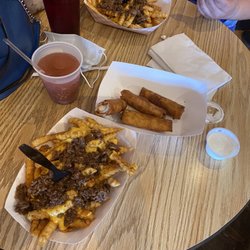 Coach's Sports Bar and Grill - Greek fries pizza logs cotton candy slushie