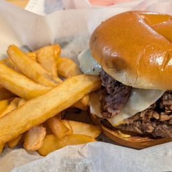River City Grill - Meat Lovers Burger and Steak Fries.