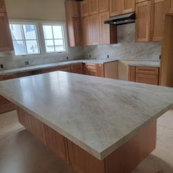 Quarzo Tile & Stone - Taj Mahal Quartzite Kitchen Remodel.