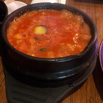 707 Sutter - Tofu soup was piping hot! My friend cracked an egg in the middle, hence the yellow yoke. - Korean Near Me - San Francisco, California