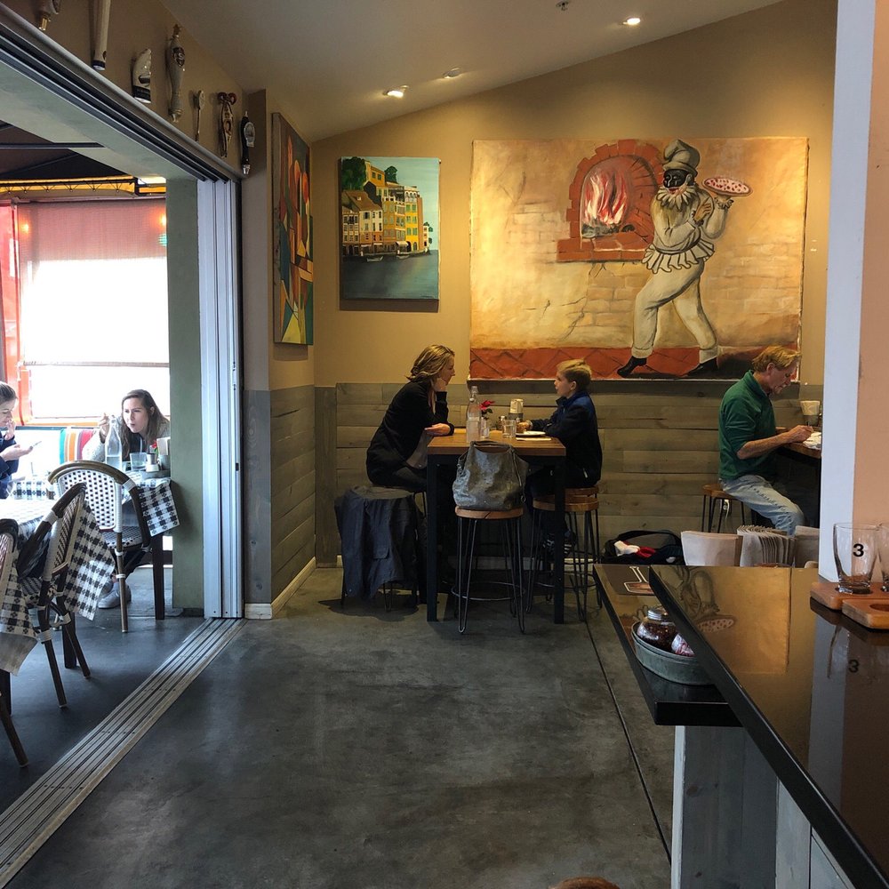 Cafe Verde pizzeria - Interior of Cafe Verde on a typical afternoon. - Italian Near Me - Corte Madera, California Cafe Verde pizzeria - Interior of Cafe Verde on a typical afternoon. - Italian Near Me - Corte Madera, California