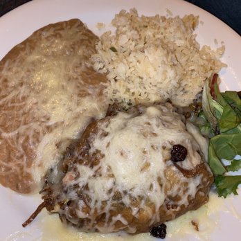 Salsa's Cantina - Chile relleno stuffed with carnitas, raisins and pecans - Mexican Near Me - Clovis, California Salsa's Cantina - Chile relleno stuffed with carnitas, raisins and pecans - Mexican Near Me - Clovis, California