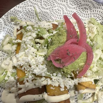 Love And Tacos - Rolled tacos made with steak and served with fresh guacamole and sour cream - Mexican Near Me - Graham, North Carolina Love And Tacos - Rolled tacos made with steak and served with fresh guacamole and sour cream - Mexican Near Me - Graham, North Carolina
