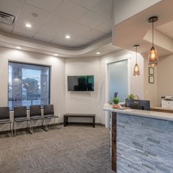 Wee Care Pediatric Dentistry & Orthodontics - Wee Care Dentistry & Orthodontic front desk and waiting area.
