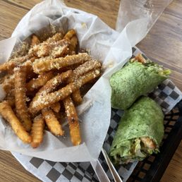 Caesar salad wrap and Parmesan fries Caesar salad wrap and Parmesan fries