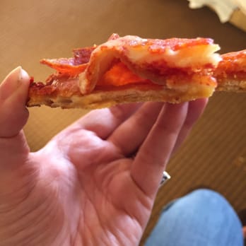 Fultano's Pizza - There is seriously a hole in the middle of every slice, with NO sauce. - Pizza Near Me - Cannon Beach, Oregon