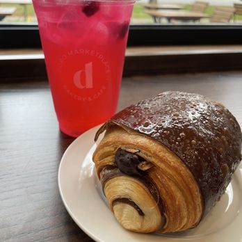 Doro Marketplace - a pastry and a drink on a table - Bakeries Near Me - Wethersfield, Connecticut Doro Marketplace - a pastry and a drink on a table - Bakeries Near Me - Wethersfield, Connecticut