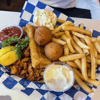Islamorada Shrimp Shack - Fried basket: clams, fish, shrimp with hush puppies and fries & coleslaw - Seafood Near Me - Islamorada, Florida Islamorada Shrimp Shack - Fried basket: clams, fish, shrimp with hush puppies and fries & coleslaw - Seafood Near Me - Islamorada, Florida