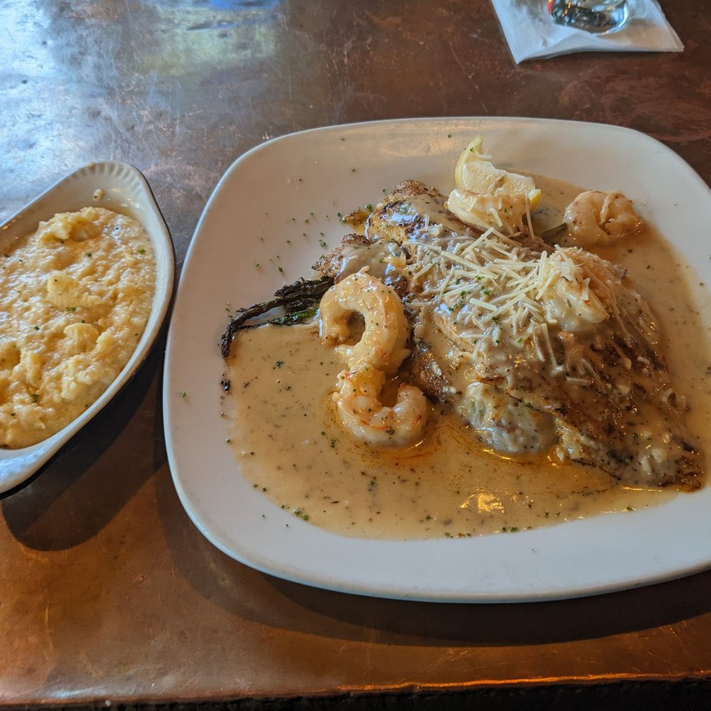 Half Shell Oyster House - Royal redfish with cheesy grits - Seafood Near Me - Biloxi, Mississippi Half Shell Oyster House - Royal redfish with cheesy grits - Seafood Near Me - Biloxi, Mississippi
