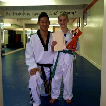 Elevate Martial Arts - Master Han with my daughter at her green belt test certification - Taekwondo Near Me - Corona del Mar, California Elevate Martial Arts - Master Han with my daughter at her green belt test certification - Taekwondo Near Me - Corona del Mar, California