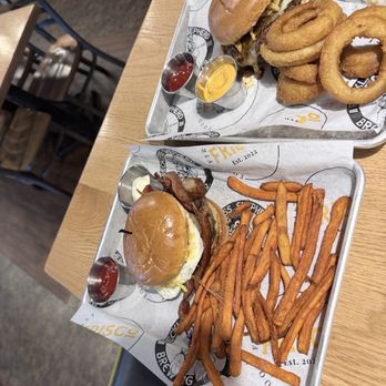 Frisco Tap House - Bacon Jammy Burger with Onion Rings and Breakfast Burger with Sweet Potato Fries - American Near Me - Gambrills, Maryland Frisco Tap House - Bacon Jammy Burger with Onion Rings and Breakfast Burger with Sweet Potato Fries - American Near Me - Gambrills, Maryland