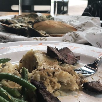 Ulele - Flank Steak 8 oz . So I ordered it well done and they cooked it perfectly! The mashed potatoes were seasoned so well and whipped perfectly. - New American Near Me - Tampa, Florida