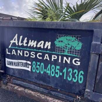 Altman Landscaping - Back of trailer with phone number - Landscaping Near Me