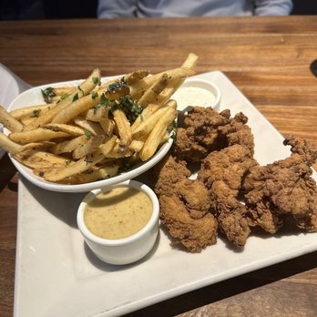 Yard House - Fried Chicken Tenders and Parmesan Truffle Fries - New American Near Me - Sacramento, California Yard House - Fried Chicken Tenders and Parmesan Truffle Fries - New American Near Me - Sacramento, California