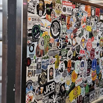 Noble Beast Brewing - The wall of other breweries stickers - Breweries Near Me - Cleveland, Ohio