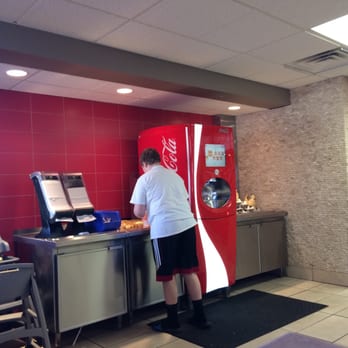 Burger King - a man standing in front of a vending machine - Burgers Near Me - Pittsburgh, Pennsylvania