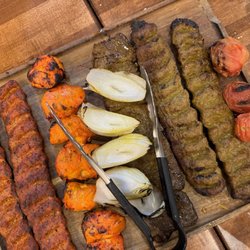 Reza Persian Grill - Combination Platter P1. Combo of beef and chicken served with choice of rice, bread and appetizer.
