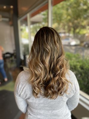 Balayage - The technique of creating soft hightlights with lightness towards the ends.