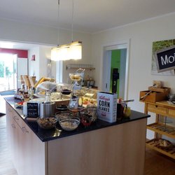 DünenNest Hotel garni - Lichtdurchfluteter Frühstücksraum im Hotel garni DünenNest | St. Peter-Ording ...weil's Ihr Urlaub ist!