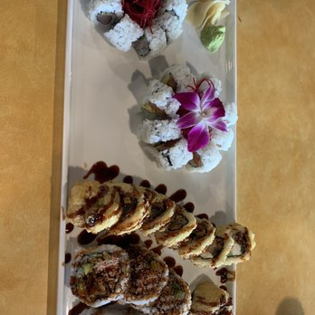Mochi Sushi - From bottom, spider roll, flying unagi, Alaskan roll and yellowtail w/ scallion roll - Sushi Bars Near Me - Waterford Township, Michigan Mochi Sushi - From bottom, spider roll, flying unagi, Alaskan roll and yellowtail w/ scallion roll - Sushi Bars Near Me - Waterford Township, Michigan