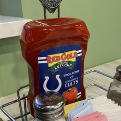 Lincoln Square Pancake House - Official Colts Ketchup! Also note the green walls. Idk about that paint color. Is that the official paint color of the Colts?