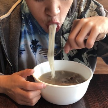 Hot Ginger Pho - Ryan eating pho noodles. He said it taste good. See video. - Vietnamese Near Me - Lacey, Washington Hot Ginger Pho - Ryan eating pho noodles. He said it taste good. See video. - Vietnamese Near Me - Lacey, Washington