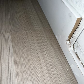 Toro Flooring - My finished product of uneven, unpainted, baseboards. - Flooring Near Me Toro Flooring - My finished product of uneven, unpainted, baseboards. - Flooring Near Me