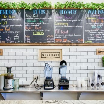 Drip Sweat - a kitchen counter with a menu on the wall - Juice Bars & Smoothies Near Me - New York, New York