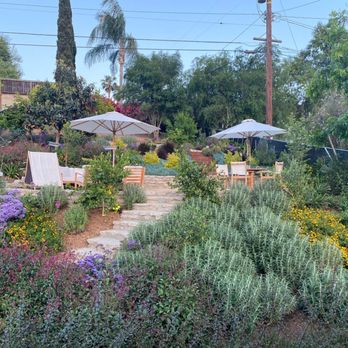 GreenArt Landscape Designs - a patio area with chairs and umbrellas - Landscaping Near Me - West Hollywood, California GreenArt Landscape Designs - a patio area with chairs and umbrellas - Landscaping Near Me - West Hollywood, California