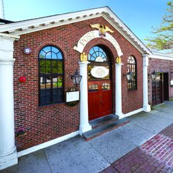 Post Office Cafe - The building's architecture, with its well-maintained exterior and vintage signage, pays homage to its former life as a bustling post office