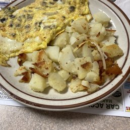 Mushroom and cheese omelette with home fries