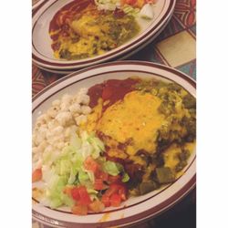 El Rialto Restaurant & Lounge - Pork tamale and pork carnitas sopapilla served with pozole. When asked if I'd like red or green sauce, I was told to say, "Christmas."