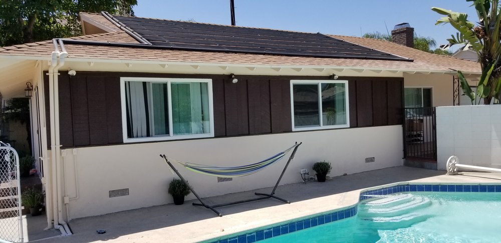 Slide of Pool Solar and Roofing