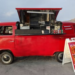 Mr Combi - a red vw bus parked in a parking lot - Food Trucks Near Me - El Paso, Texas