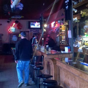 Headquarters Tavern - a man standing at the bar - Dive Bars Near Me - Mineral, Washington Headquarters Tavern - a man standing at the bar - Dive Bars Near Me - Mineral, Washington