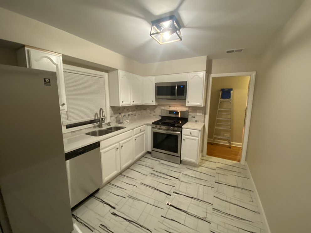 Slide of In & Out Construction