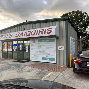 Cupid's Daiquiris - Outside drive thru - Drive-Thru Bars Near Me - Lafayette, Louisiana Cupid's Daiquiris - Outside drive thru - Drive-Thru Bars Near Me - Lafayette, Louisiana