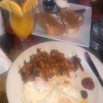 Julians - Homefries, fried egg and french toast. With a mango mimosa !! - New American Near Me - Providence, Rhode Island Julians - Homefries, fried egg and french toast. With a mango mimosa !! - New American Near Me - Providence, Rhode Island