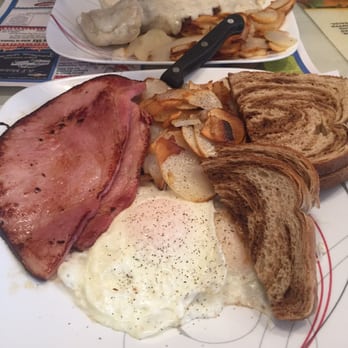 Stuff’s Restaurant - My son had the biscuits and gravy with eggs. I had eggs with ham.  Love the American fries. - American Near Me - Wisconsin Dells, Wisconsin