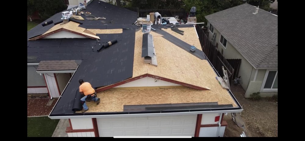 Slide of Freeman Roofing