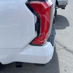 Diamond Auto Body - Before- damage to tail light and bumper